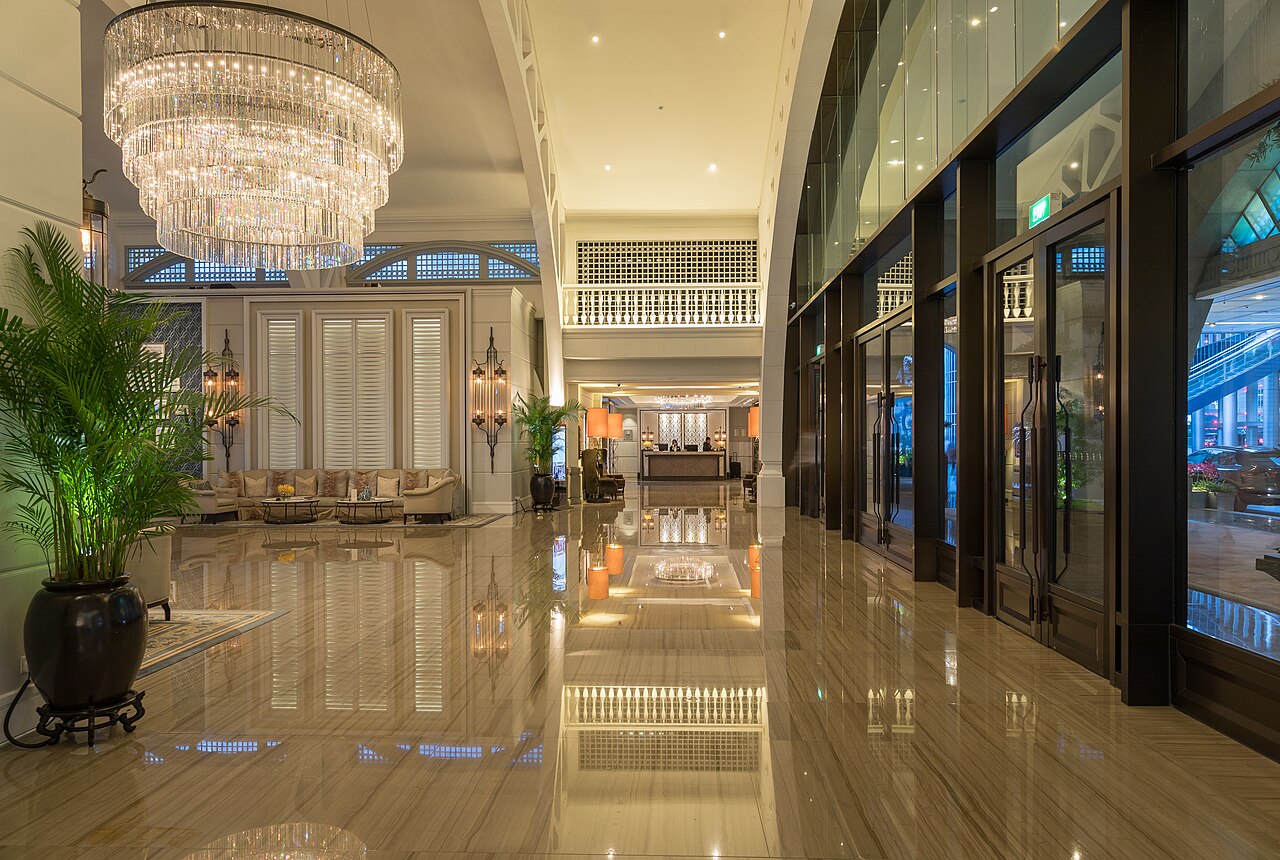 Reception hall with reflecting floor and chandelier at The Fullerton Bay Hotel Singapore